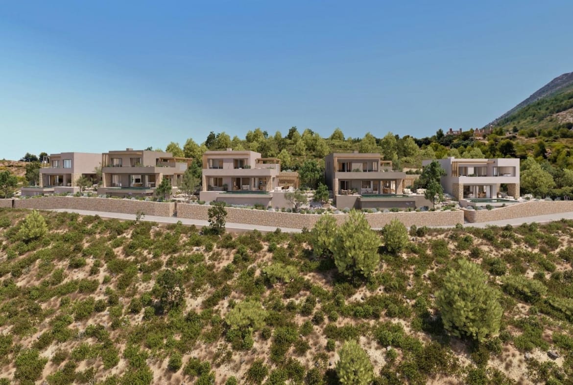 Aerial view of five private villas set into the Llíber hillside