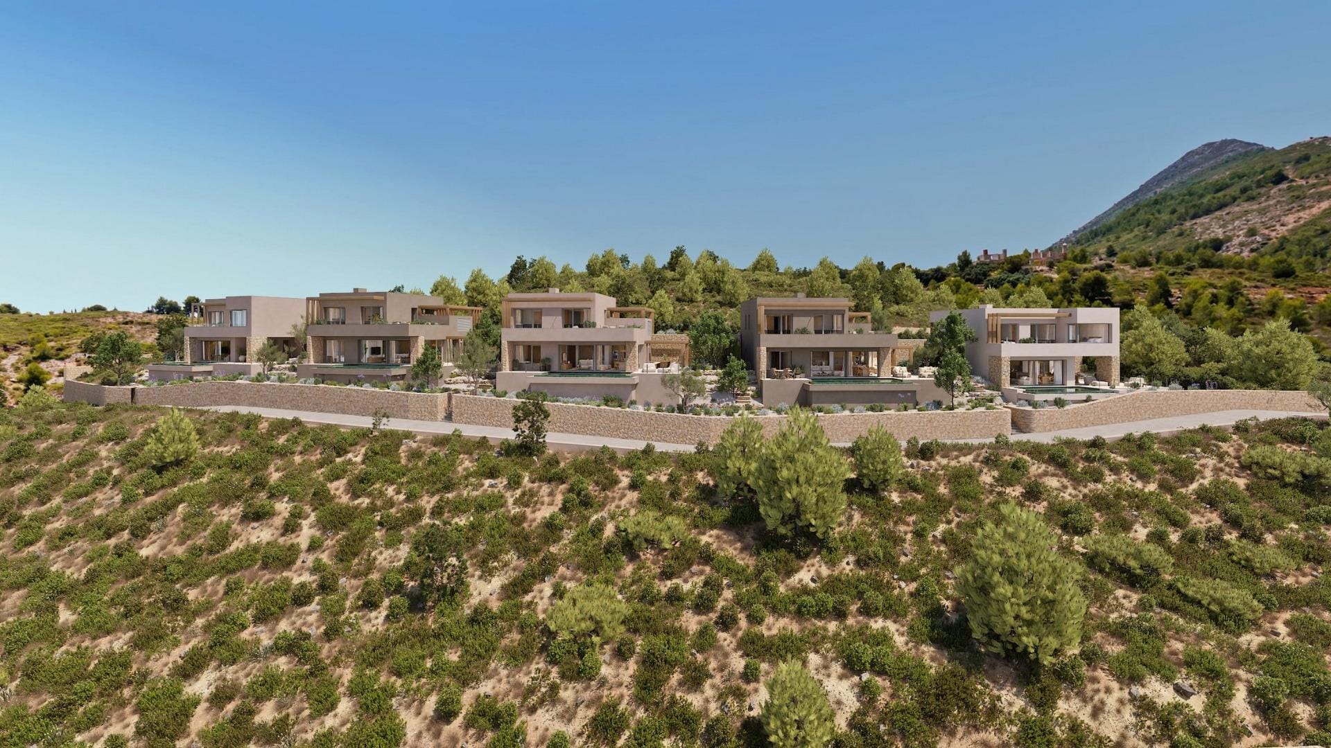 Aerial view of five private villas set into the Llíber hillside