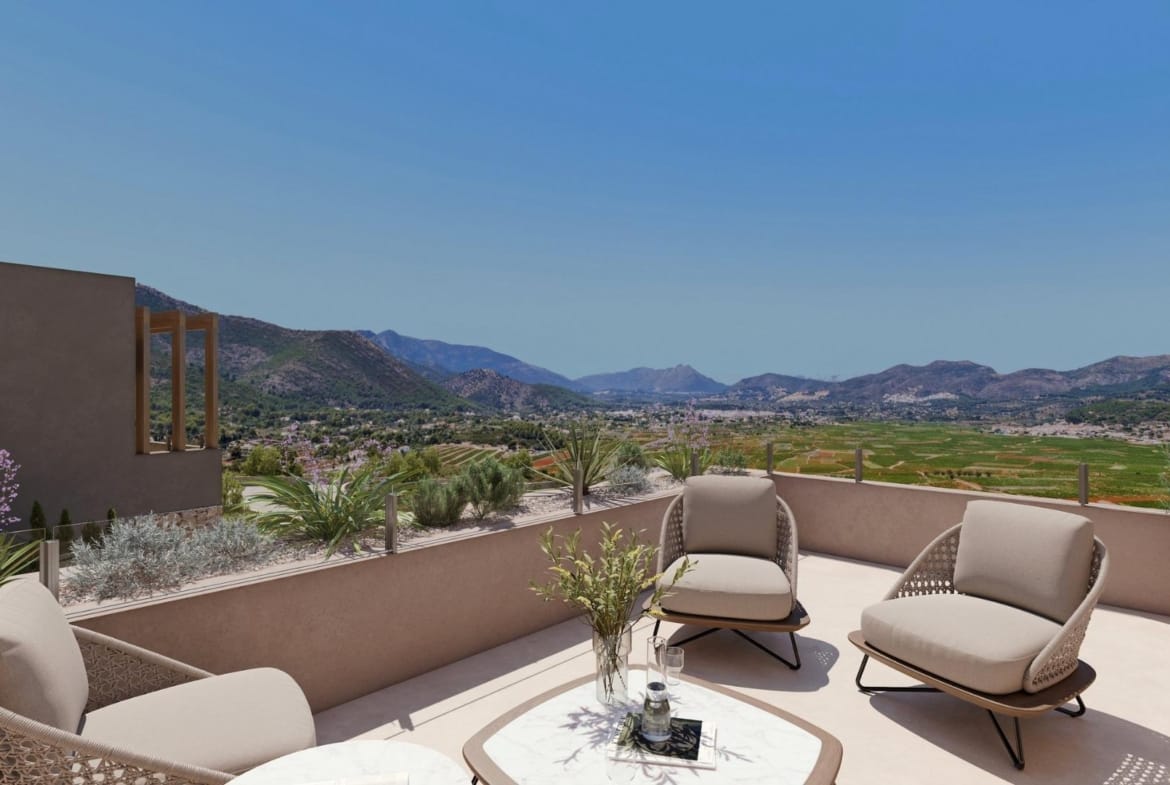 Upper terrace with seating and panoramic valley and mountain views