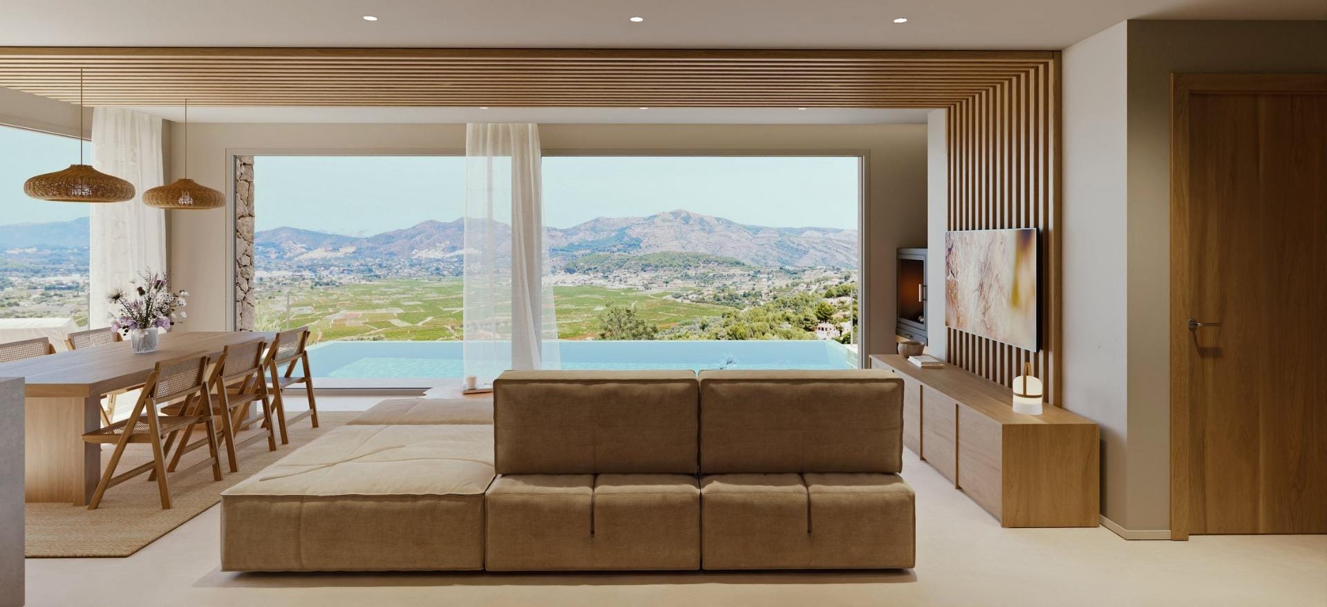 Living room facing the private pool and Vall de Pop landscape