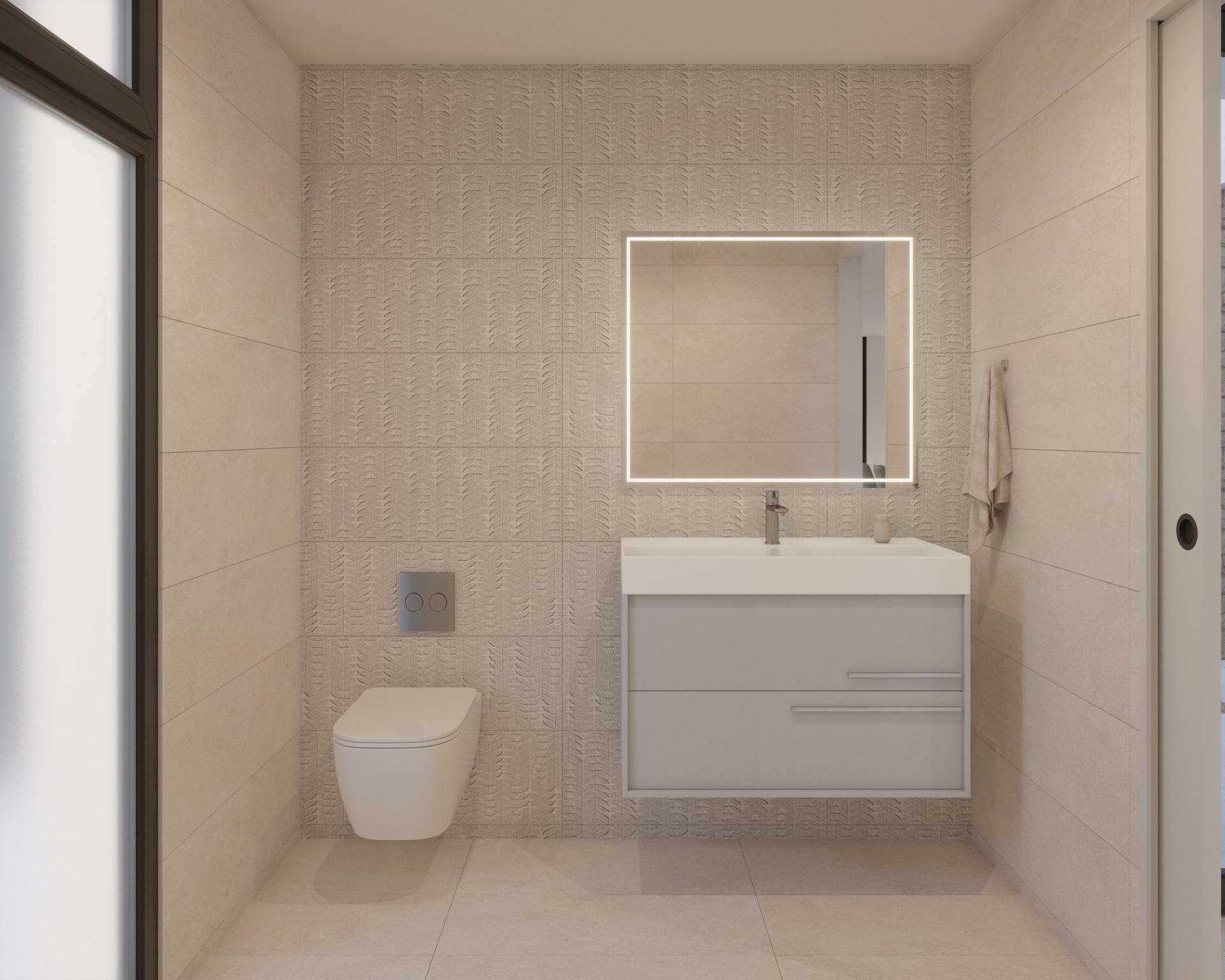 Small bathroom with illuminated square mirror, sink vanity and tiled walls