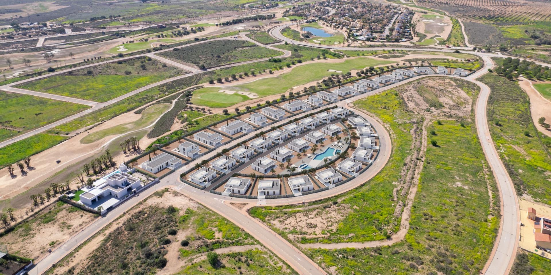 Aerial view of a curved residential development beside golf fairways and surrounding roads