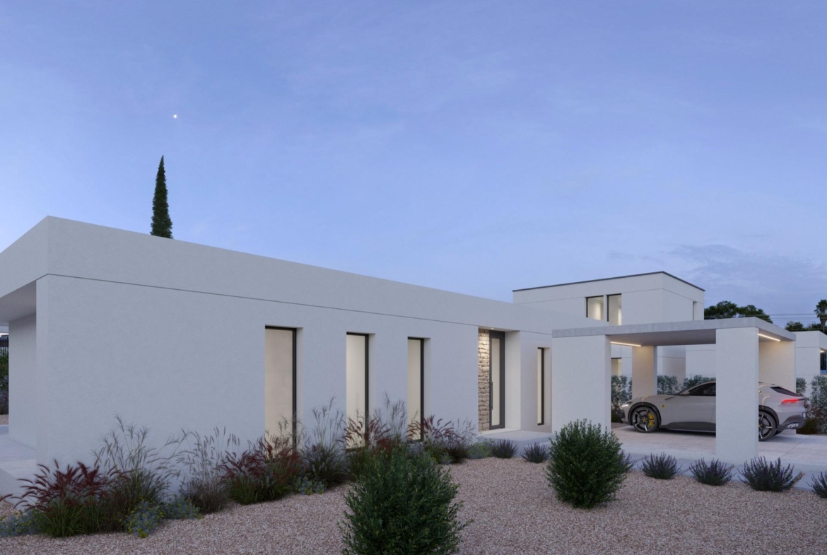 Modern villa frontage with covered carport, landscaped gravel garden and tall cypress