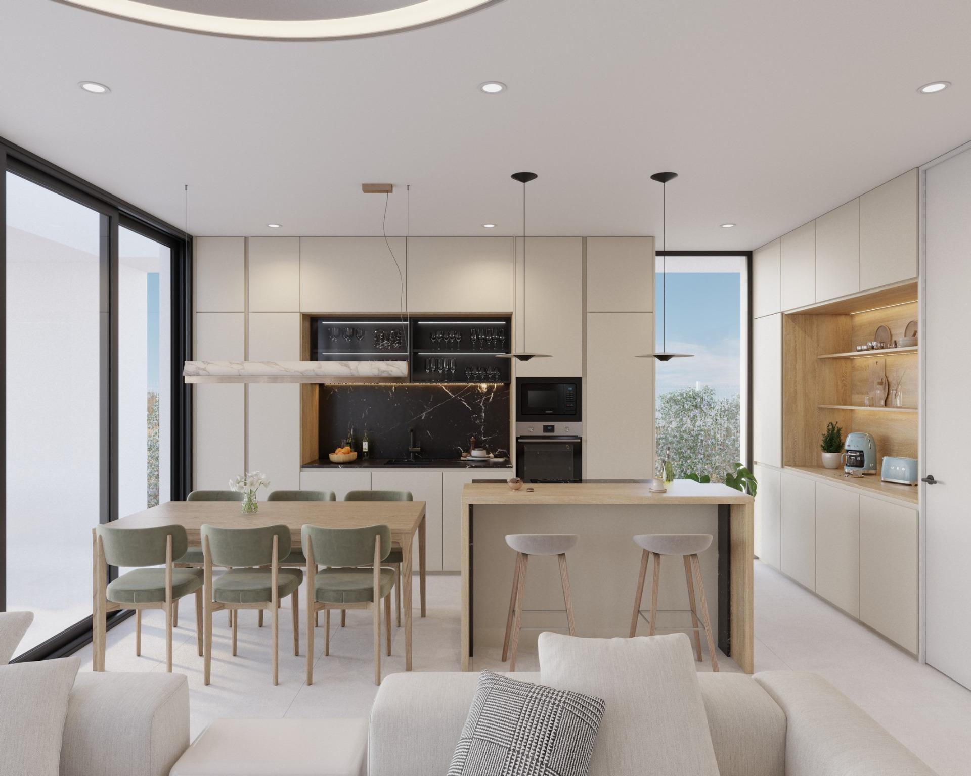 Contemporary kitchen island and dining area flowing into a bright living room