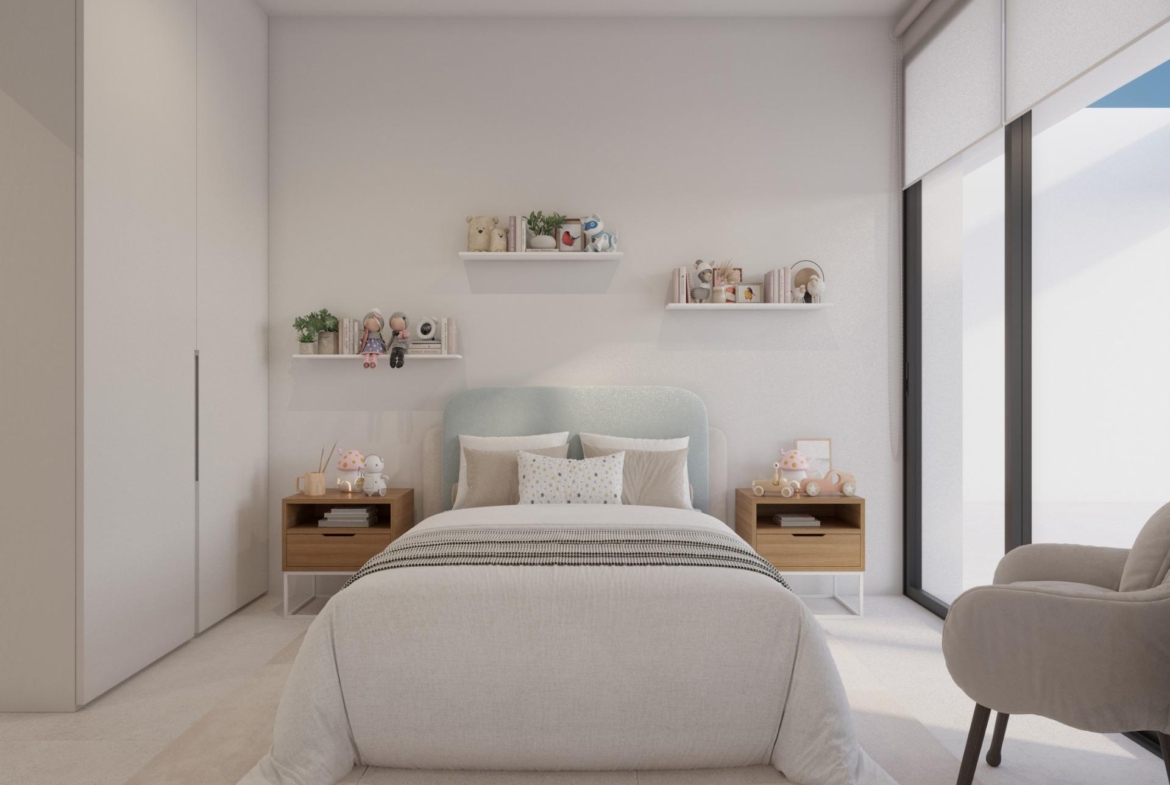 Bedroom with upholstered bed, bedside tables and sliding doors onto private terrace