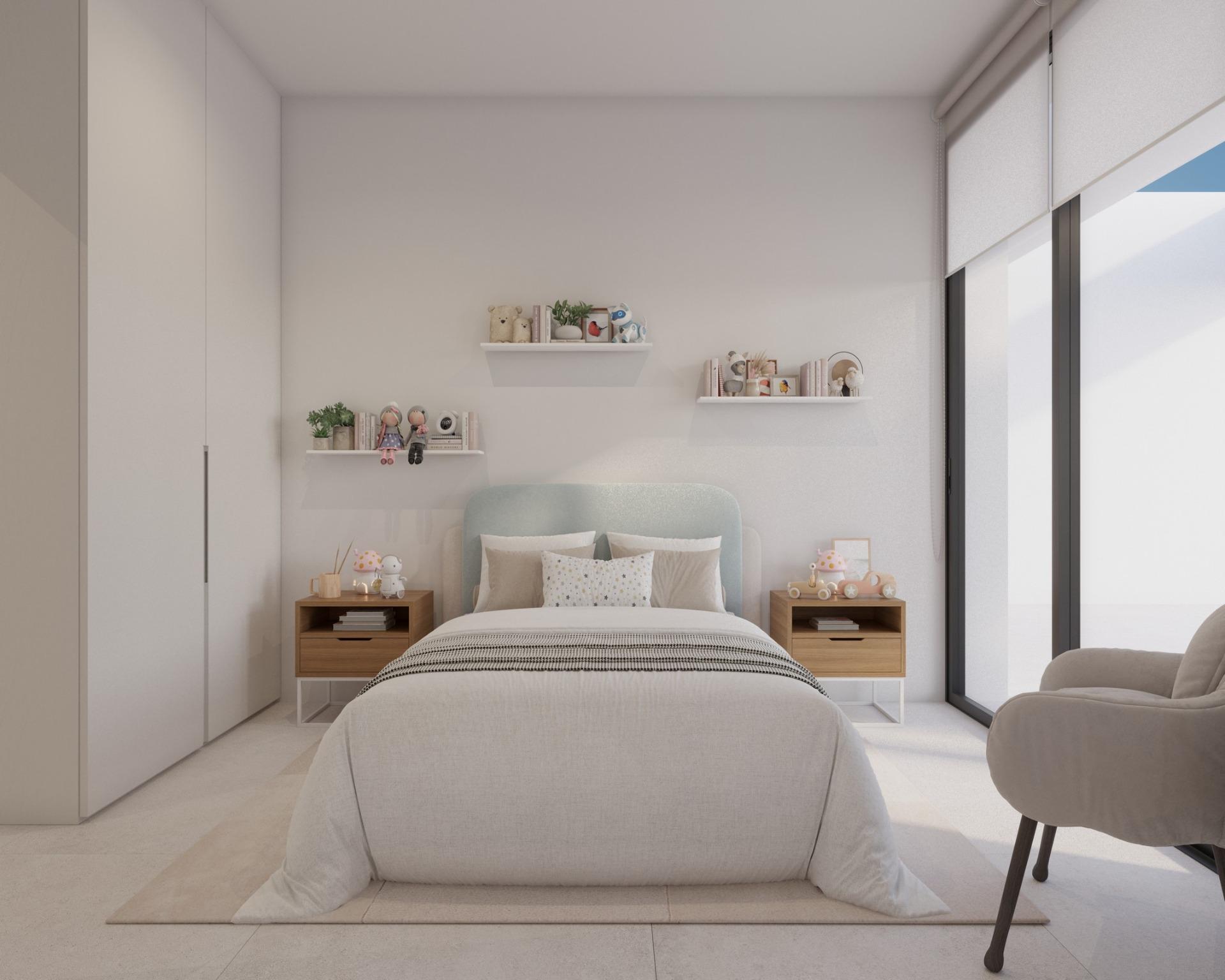 Bedroom with upholstered bed, bedside tables and sliding doors onto private terrace