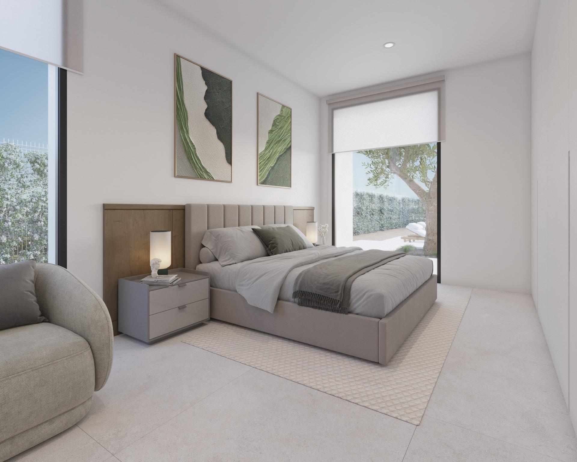 Master bedroom front view with bed, bedside tables and floor-to-ceiling sliding doors