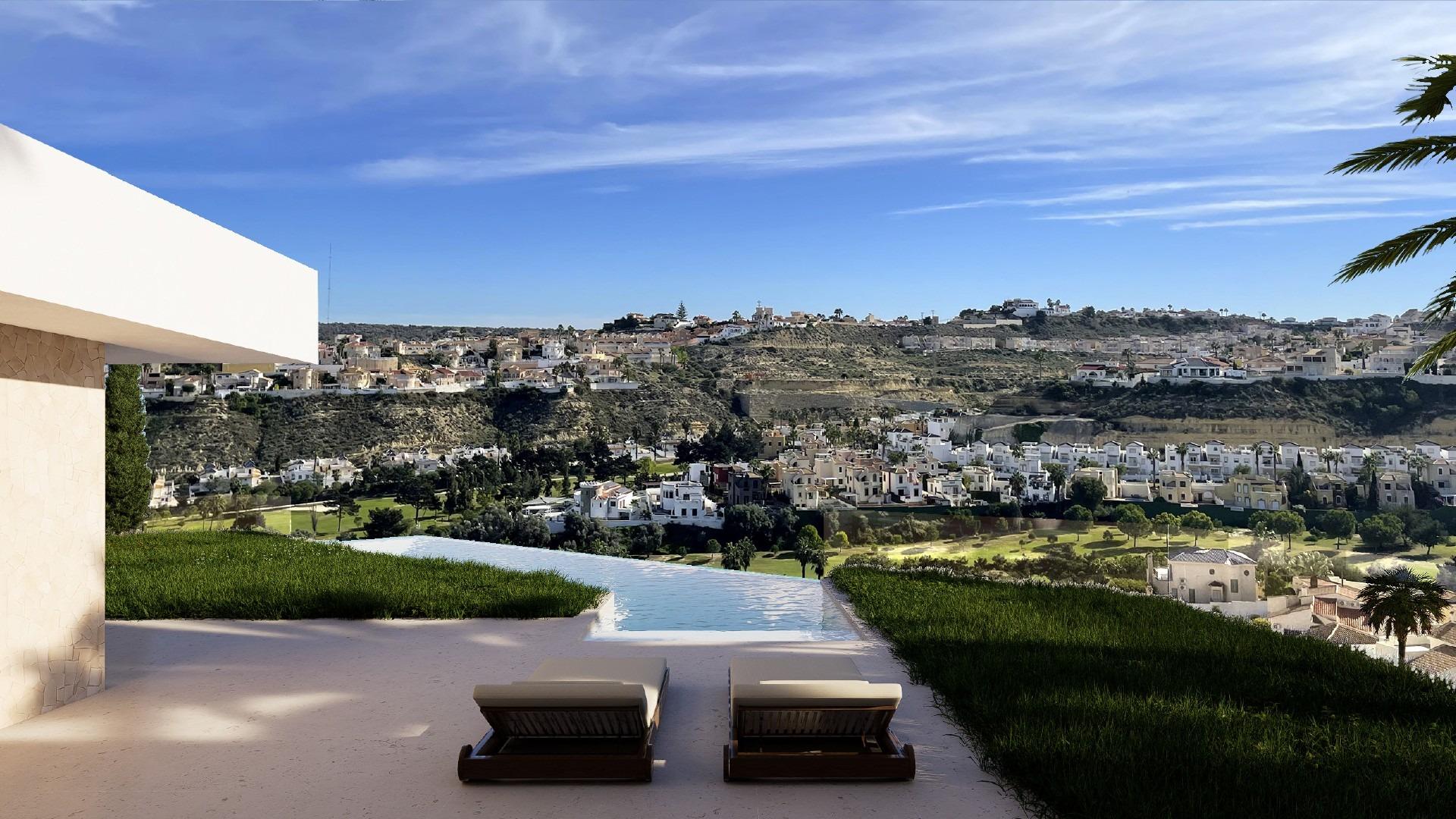Terrace viewpoint with lounge chairs overlooking golf course and surrounding hillside homes