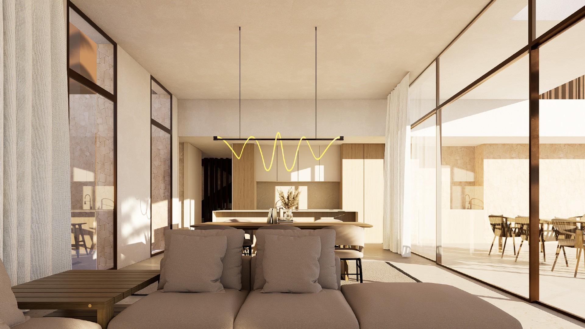 Open-plan living and dining area with pendant light, sofa and kitchen island visible