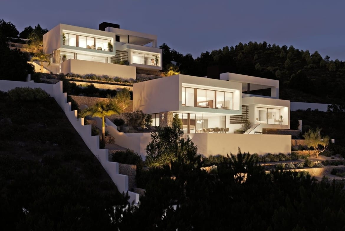 Evening rendering of neighbouring contemporary villas on a landscaped hillside in Sierra de Altea, Altea, Alicante