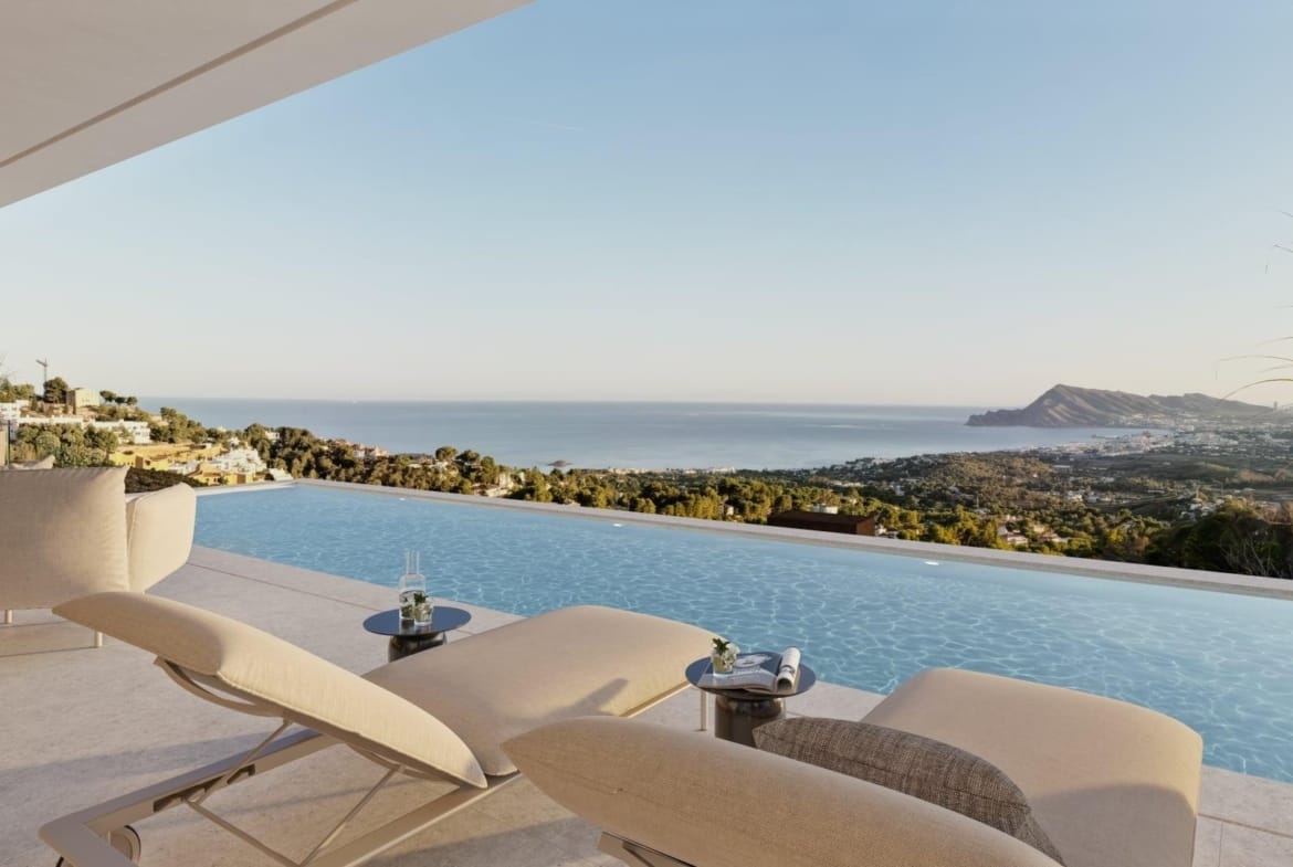 Covered terrace rendering with sun loungers beside an infinity pool and sea views in Sierra de Altea, Altea, Alicante