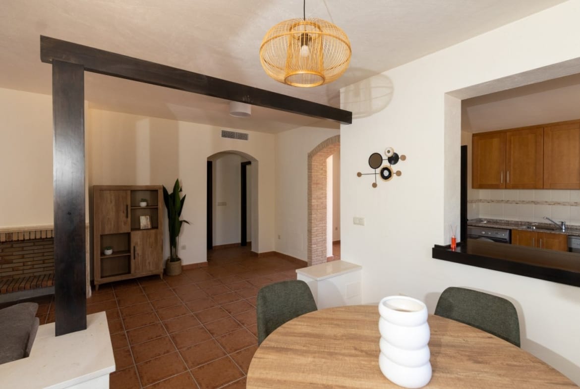 Dining area overlooking the lounge and entrance hallway in Las Palas, Fuente Álamo, Murcia