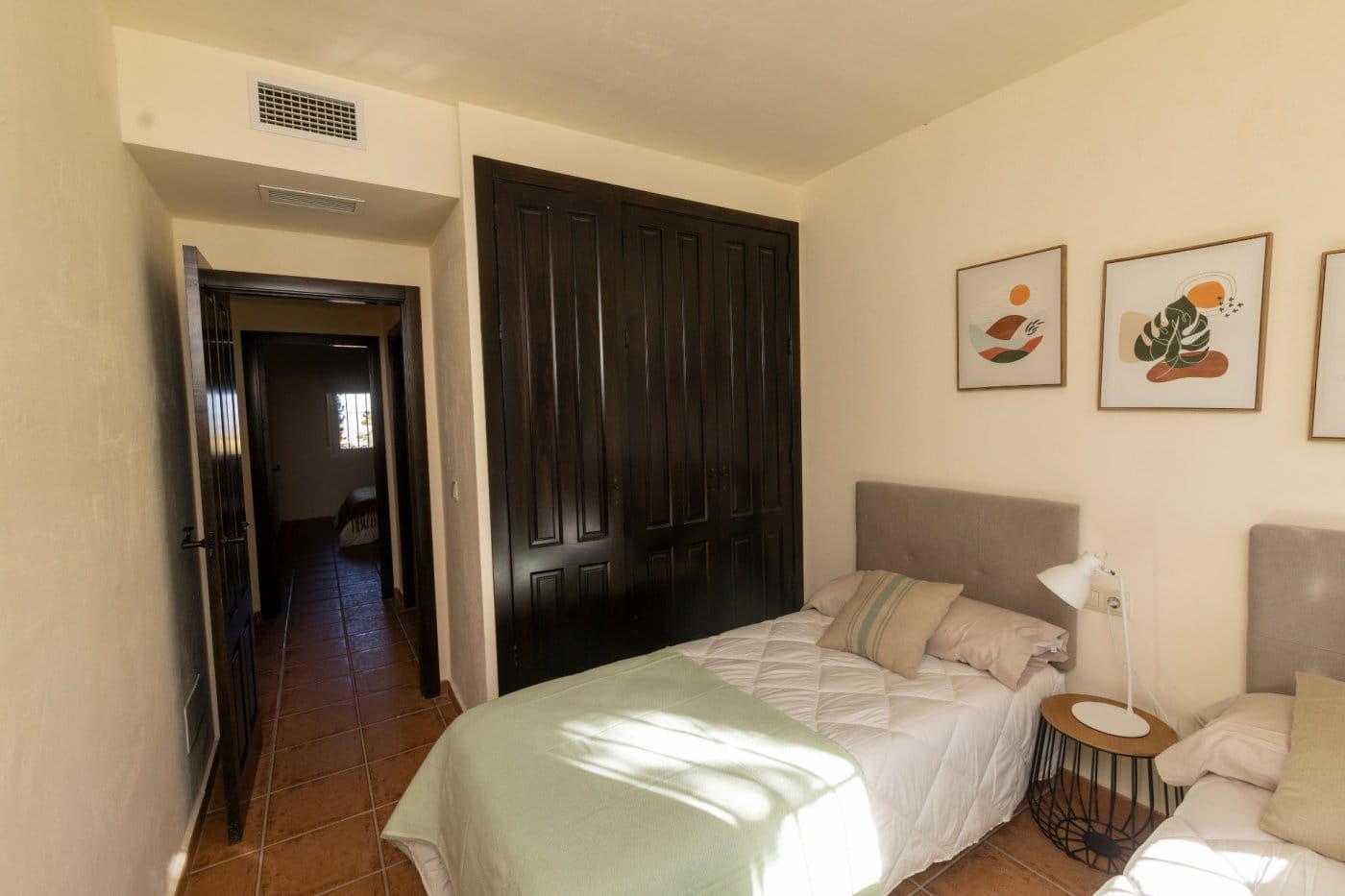 Twin bedroom with sunlight across the beds in Las Palas, Fuente Álamo, Murcia
