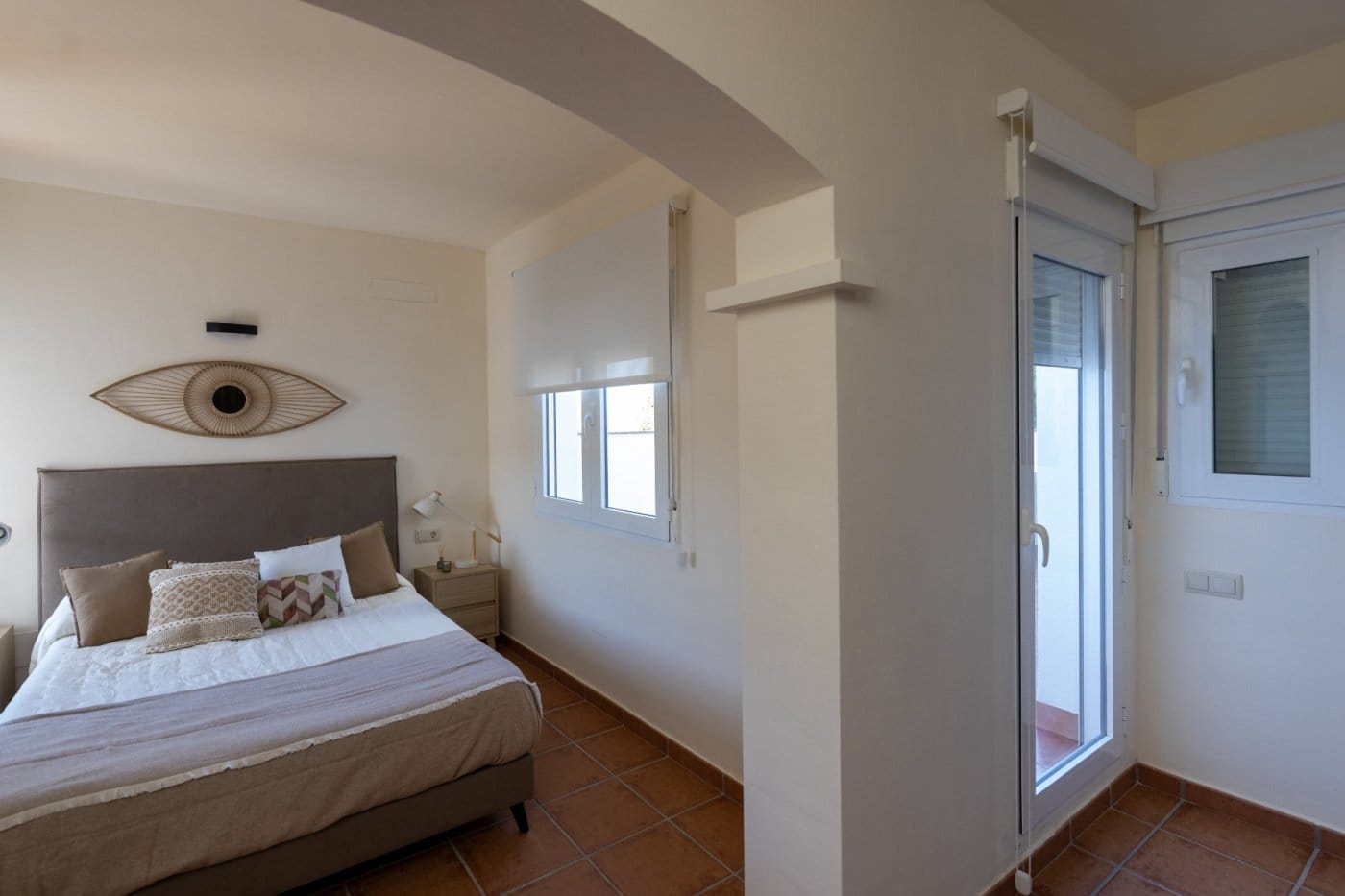 Double bedroom beside a glazed exterior door in Las Palas, Fuente Álamo, Murcia