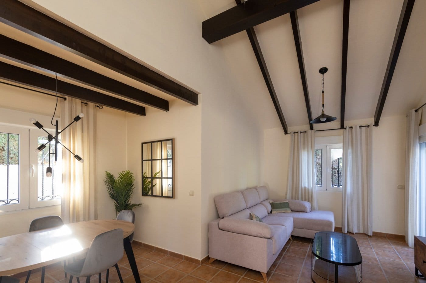 KEY-READY-VILLA-IN-FUENTE-ALAMO-MURCIA-13 Living and dining area with a sofa and glass coffee table in Las Palas, Fuente Álamo, Murcia