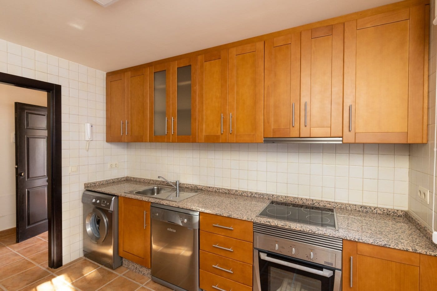 KEY-READY-VILLA-IN-FUENTE-ALAMO-MURCIA-18 Kitchen with wooden cabinets, an oven and tiled splashback in Las Palas, Fuente Álamo, Murcia