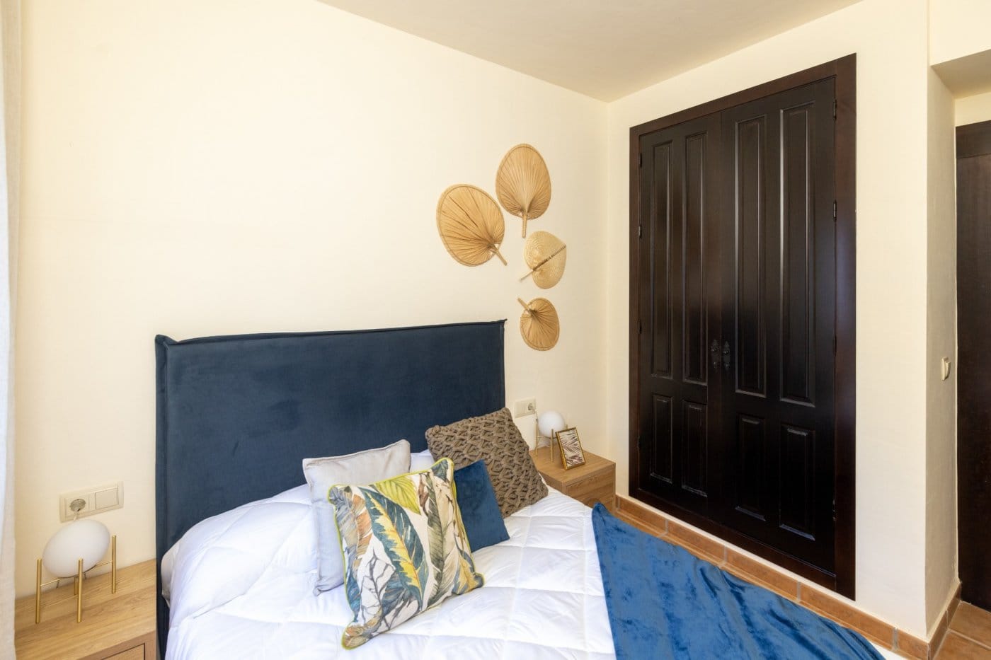 KEY-READY-VILLA-IN-FUENTE-ALAMO-MURCIA-18 Double bedroom with a blue headboard and dark wardrobes in Las Palas, Fuente Álamo, Murcia