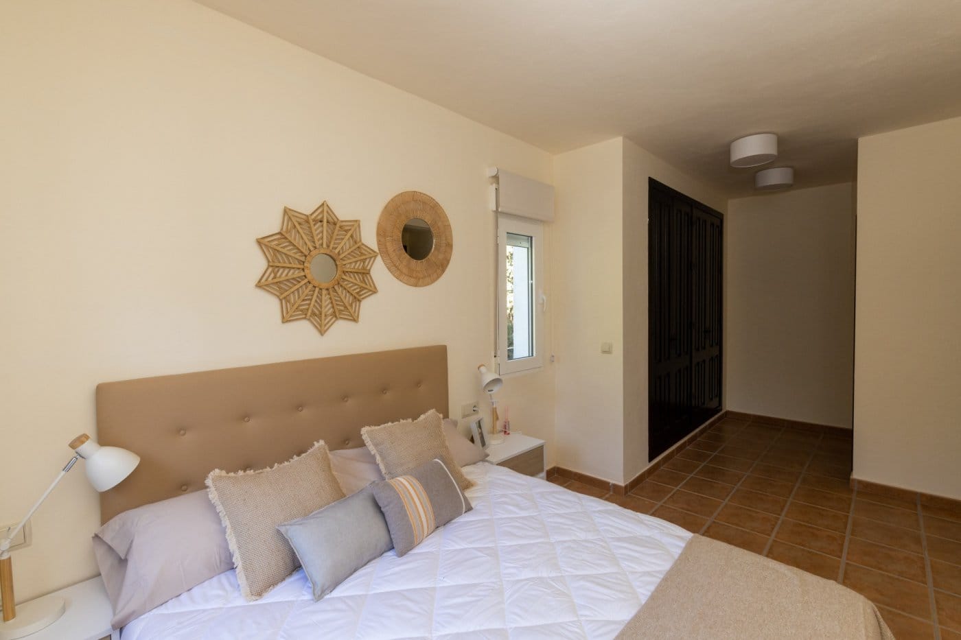 KEY-READY-VILLA-IN-FUENTE-ALAMO-MURCIA-28 Double bedroom with a beige headboard and dressing area in Las Palas, Fuente Álamo, Murcia