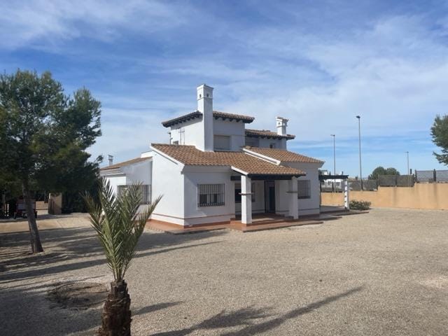 Detached villa in a gravel garden with a side pergola in Las Palas, Fuente Álamo, Murcia