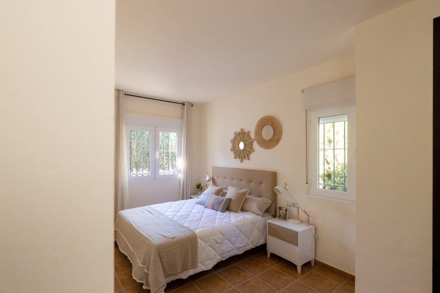 KEY-READY-VILLA-IN-FUENTE-ALAMO-MURCIA-34 Doorway framing a double bedroom with two windows in Las Palas, Fuente Álamo, Murcia