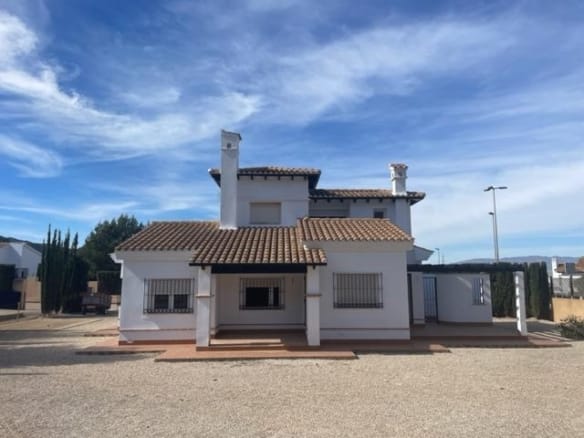 White villa with an upper storey, covered porch and gravel garden in Las Palas, Fuente Álamo, Murcia
