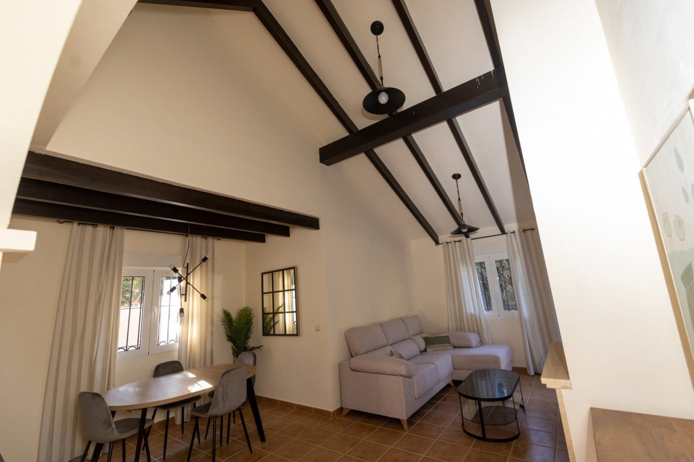KEY-READY-VILLA-IN-FUENTE-ALAMO-MURCIA-5 Living and dining room with timber beams and a vaulted ceiling in Las Palas, Fuente Álamo, Murcia