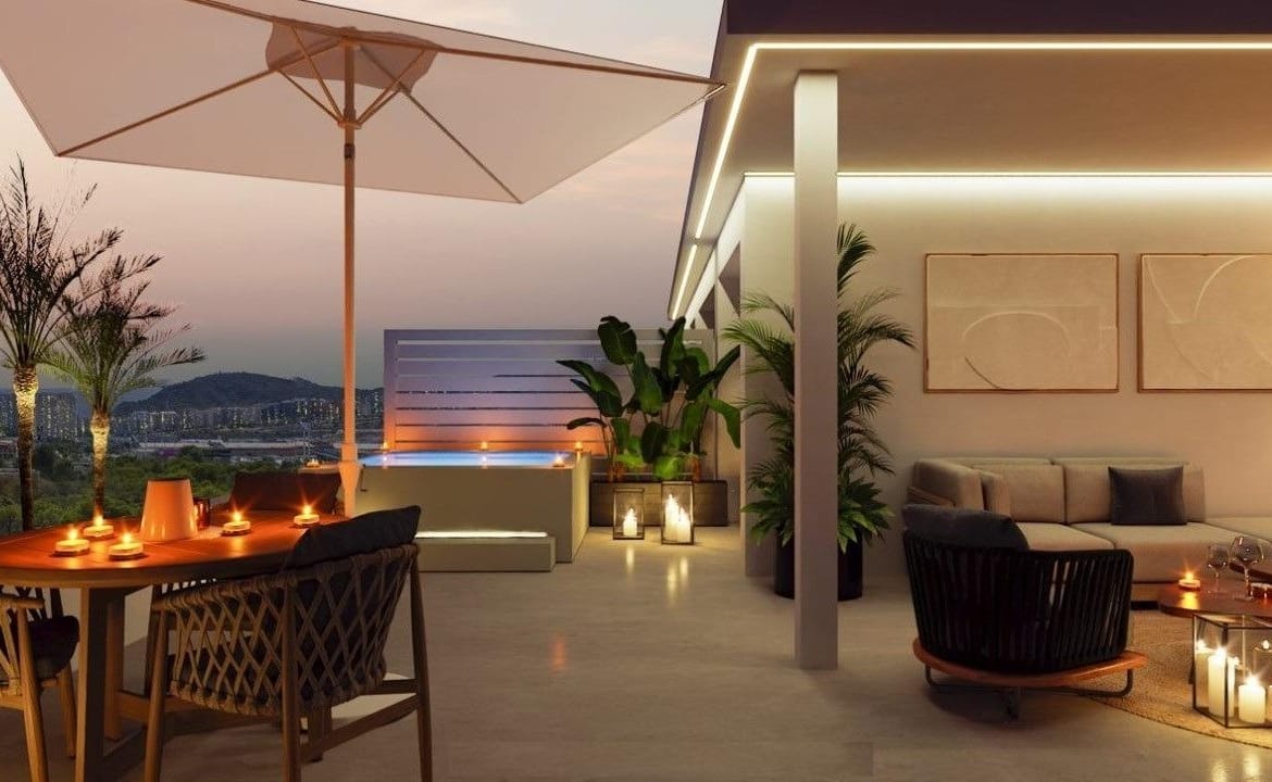 Evening terrace with outdoor dining, an umbrella and a sheltered lounge area in Sierra Cortina, Alicante