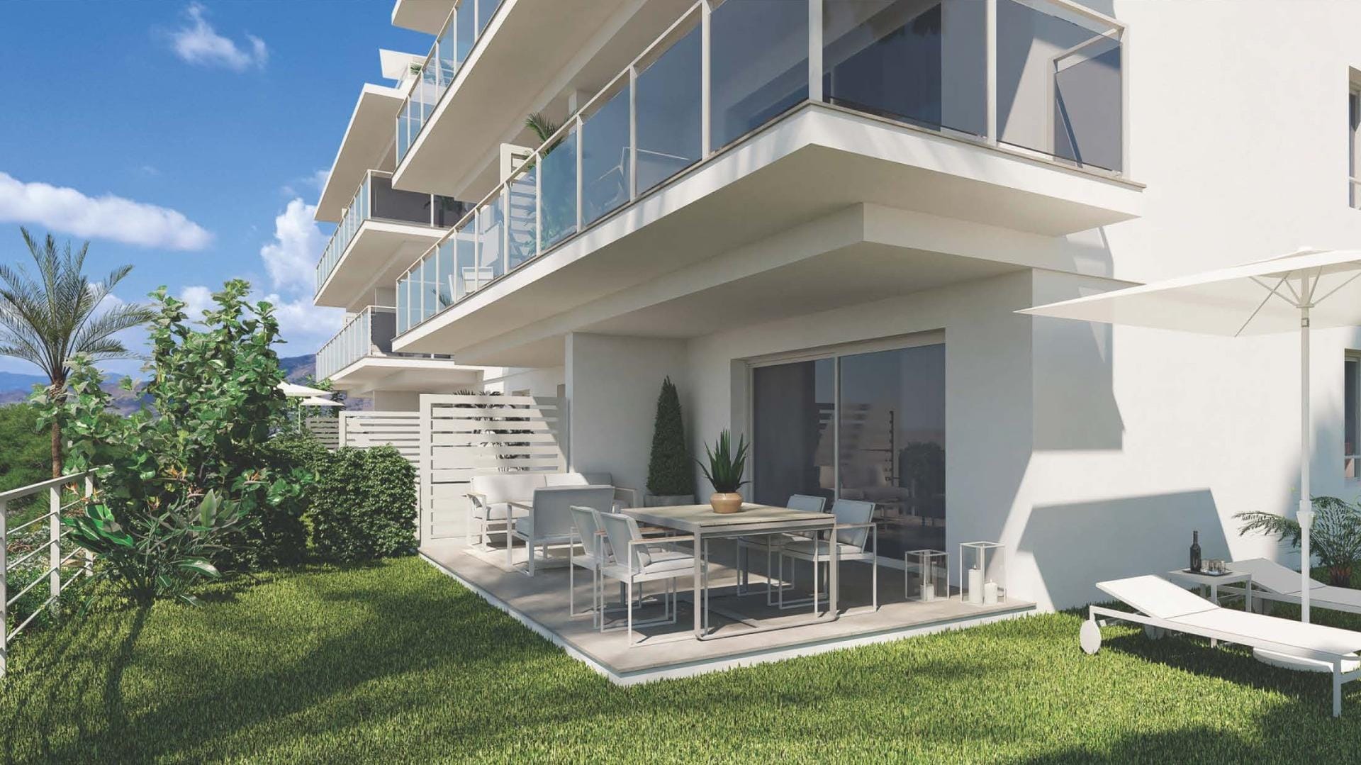 Apartment facade with glass balconies above a ground-floor patio and garden in Sierra Cortina, Alicante