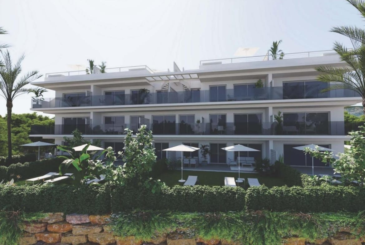 Low-rise apartment building with broad balconies and landscaped communal gardens in Sierra Cortina, Alicante
