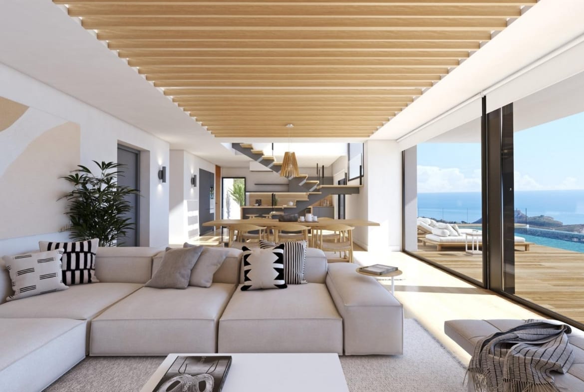 Rendering of an open living room with timber ceiling details and broad sea-view windows in Cumbre del Sol, Benitachell, Alicante