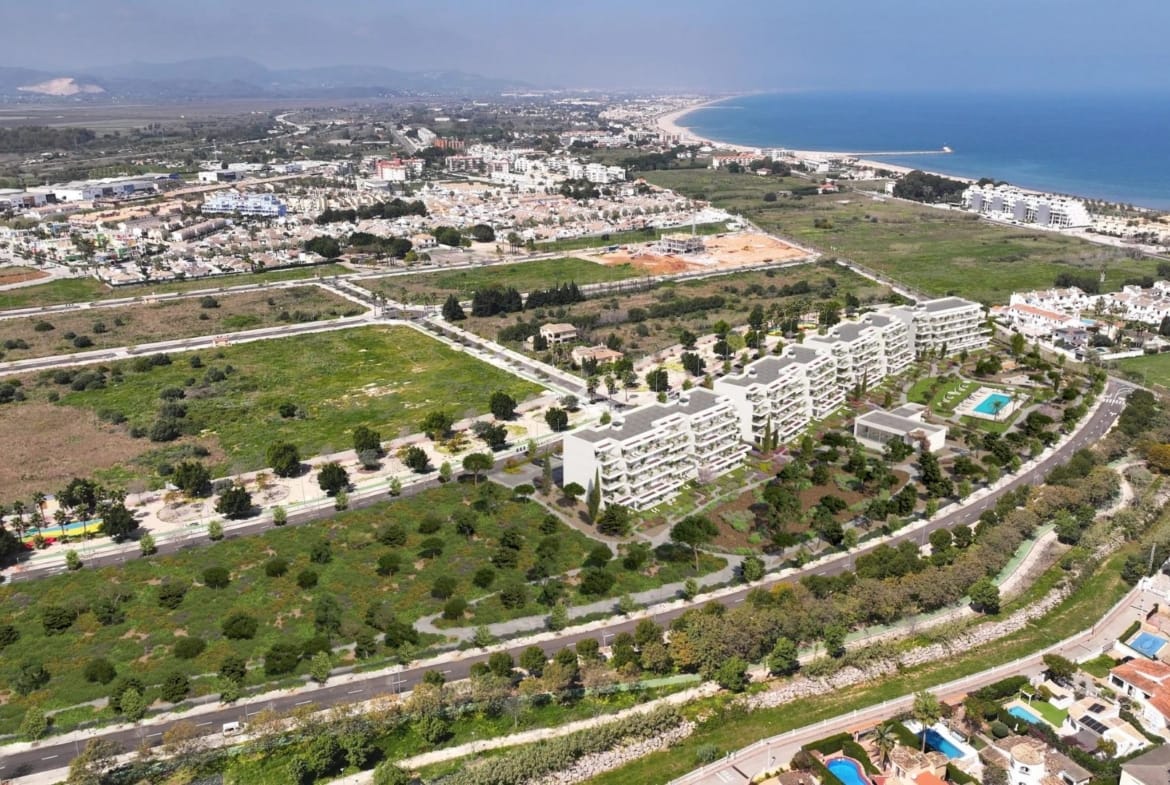 Aerial view of the residential complex near the coast and surrounding area in El Verger, Alicante