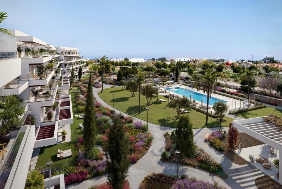 Elevated view of landscaped communal gardens and the outdoor pool in El Verger, Alicante