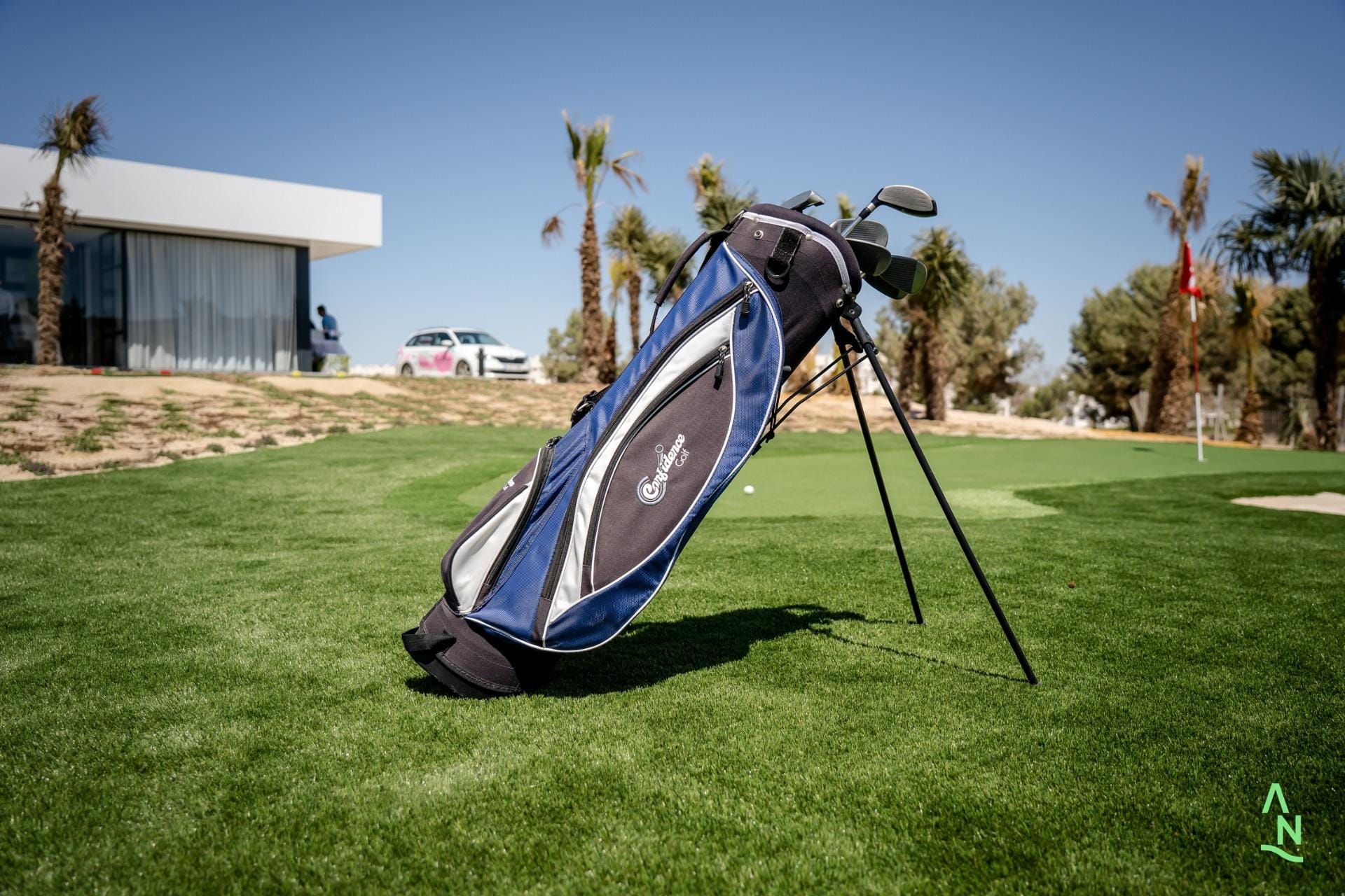 NEW-BUILD-APARTMENTS-IN-CONDADO-DE-ALHAMA-GOLF-COURSE-22 Golf bag on the putting green near the clubhouse