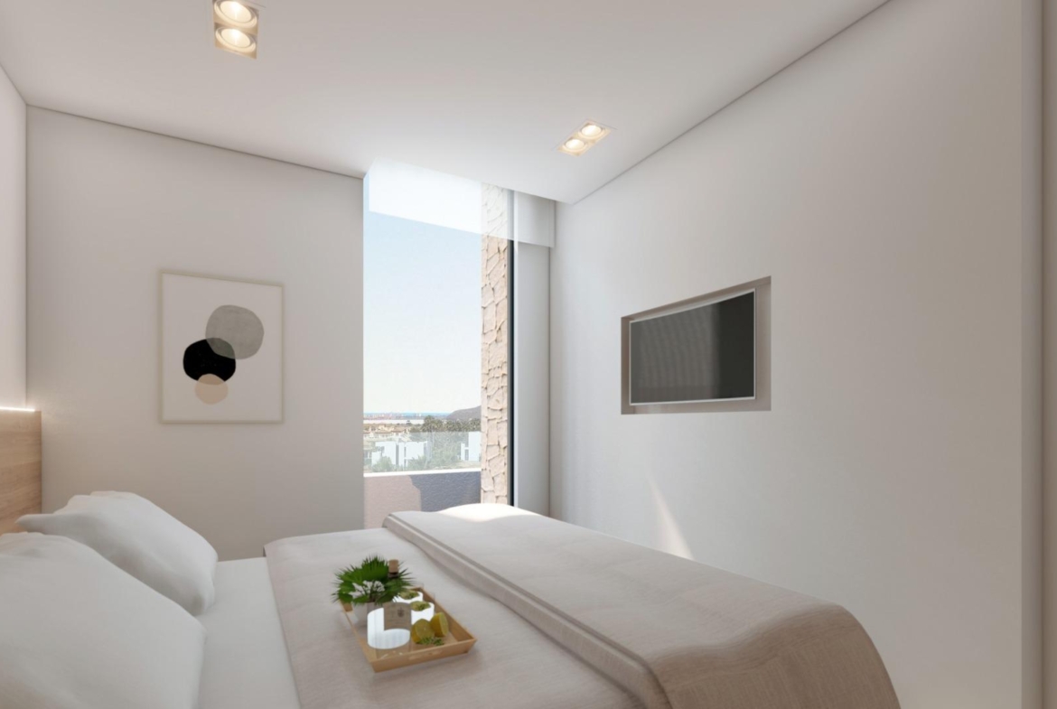 NEW-BUILD-RESIDENTIAL-COMPLEX-IN-LA-MANGA-CLUB-RESORT-11 Double bedroom with views towards the Mar Menor