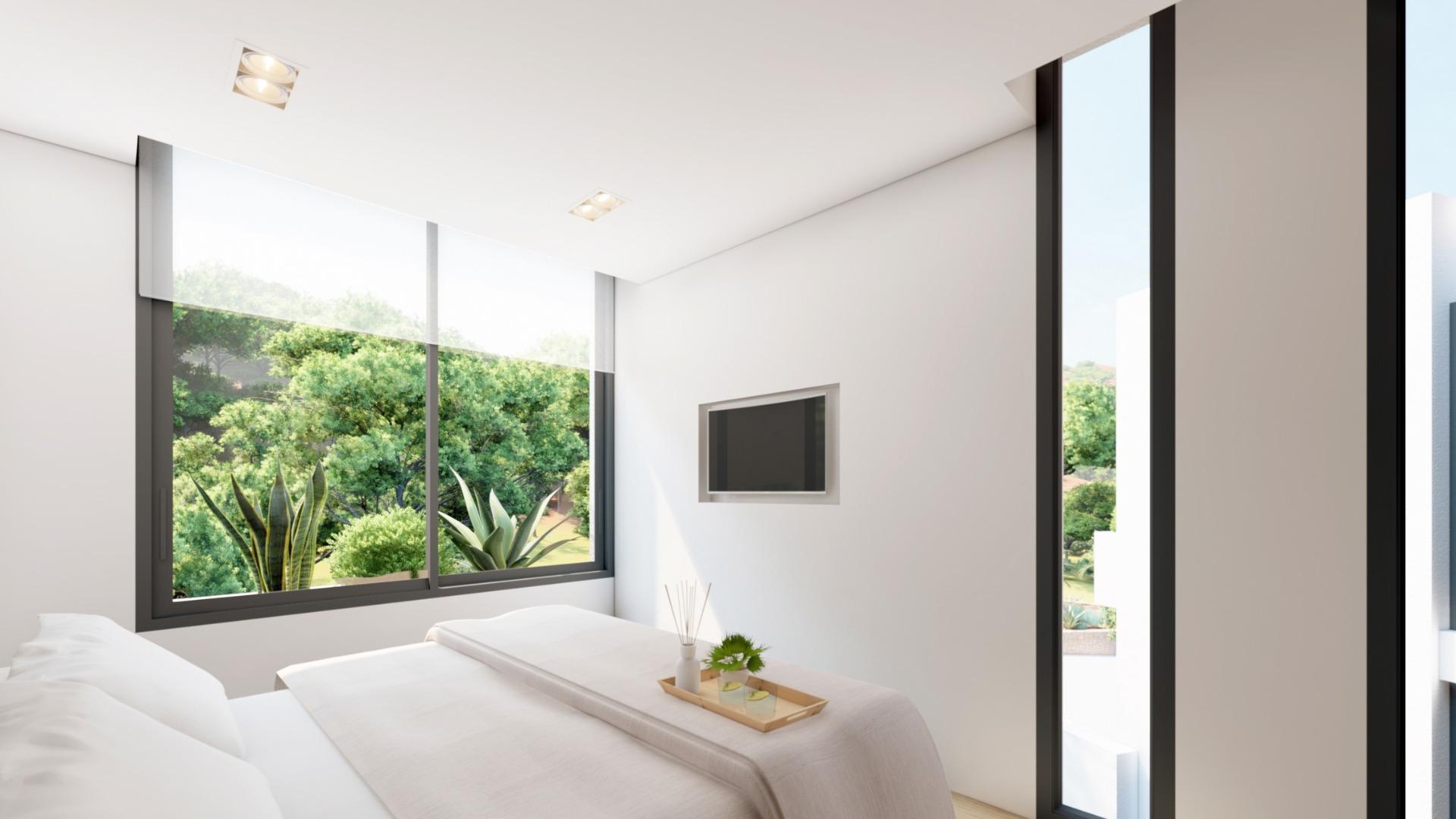 NEW-BUILD-RESIDENTIAL-COMPLEX-IN-LA-MANGA-CLUB-RESORT-11 Double bedroom with green resort views at La Manga Club