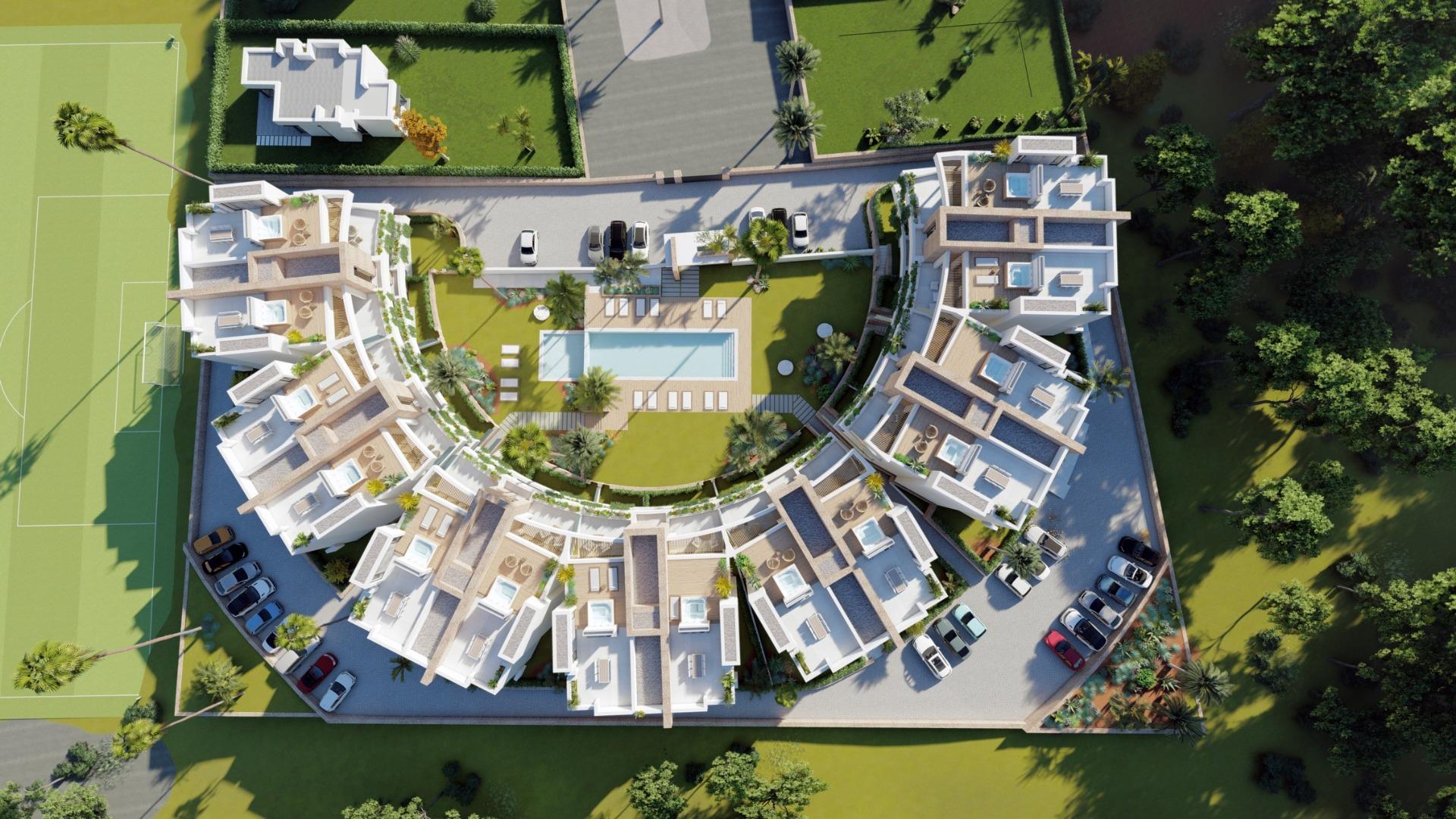 NEW-BUILD-RESIDENTIAL-COMPLEX-IN-LA-MANGA-CLUB-RESORT-14 Aerial site layout with communal pool, gardens and apartment buildings