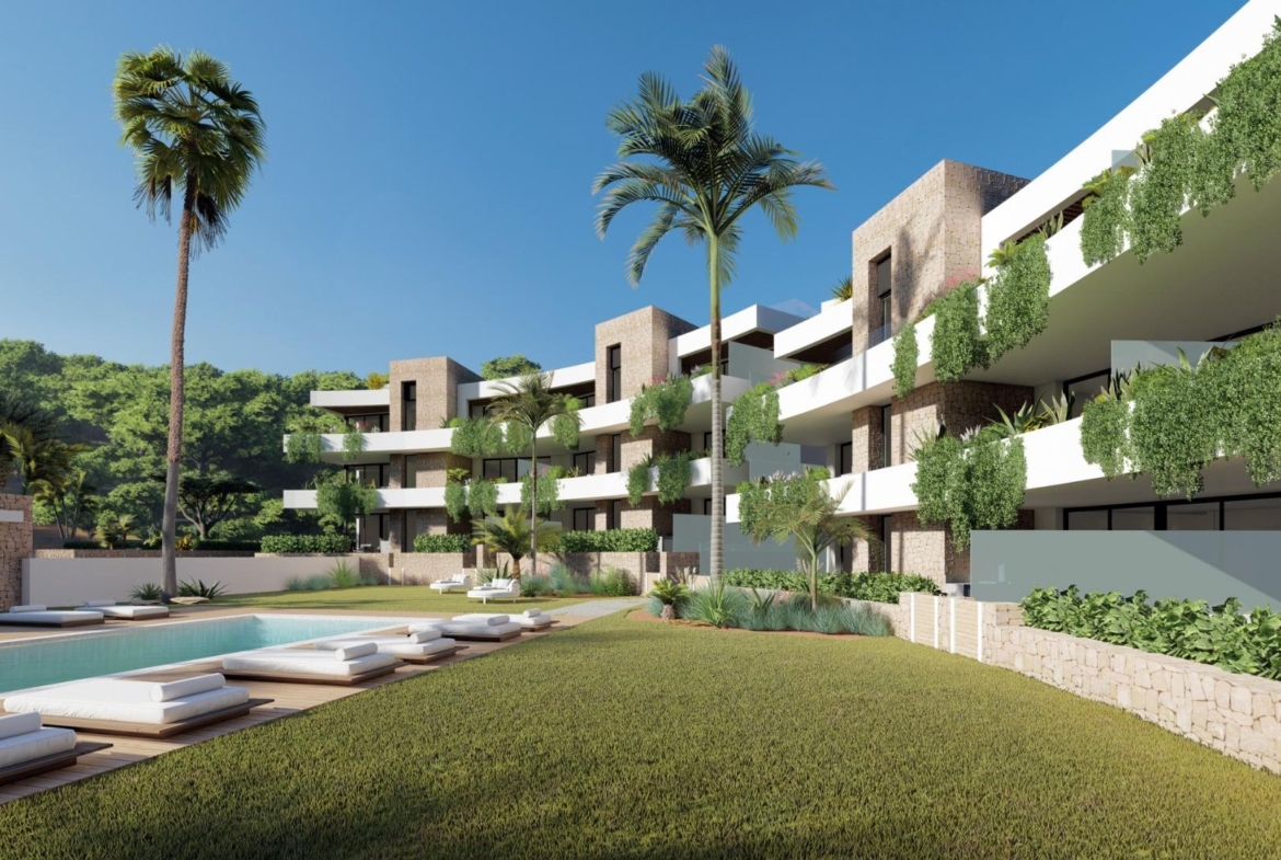NEW BUILD RESIDENTIAL COMPLEX IN LA MANGA CLUB RESORT Communal pool and landscaped gardens beside contemporary apartments in La Manga Club