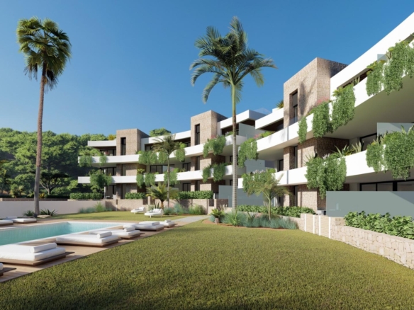 Communal pool and landscaped gardens beside contemporary apartments in La Manga Club