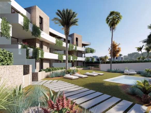 Communal pool and landscaped gardens beside contemporary apartments in La Manga Club