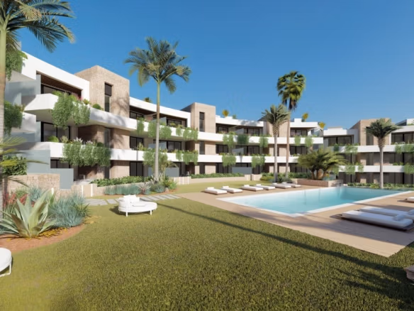Communal pool and landscaped gardens beside contemporary apartments in La Manga Club