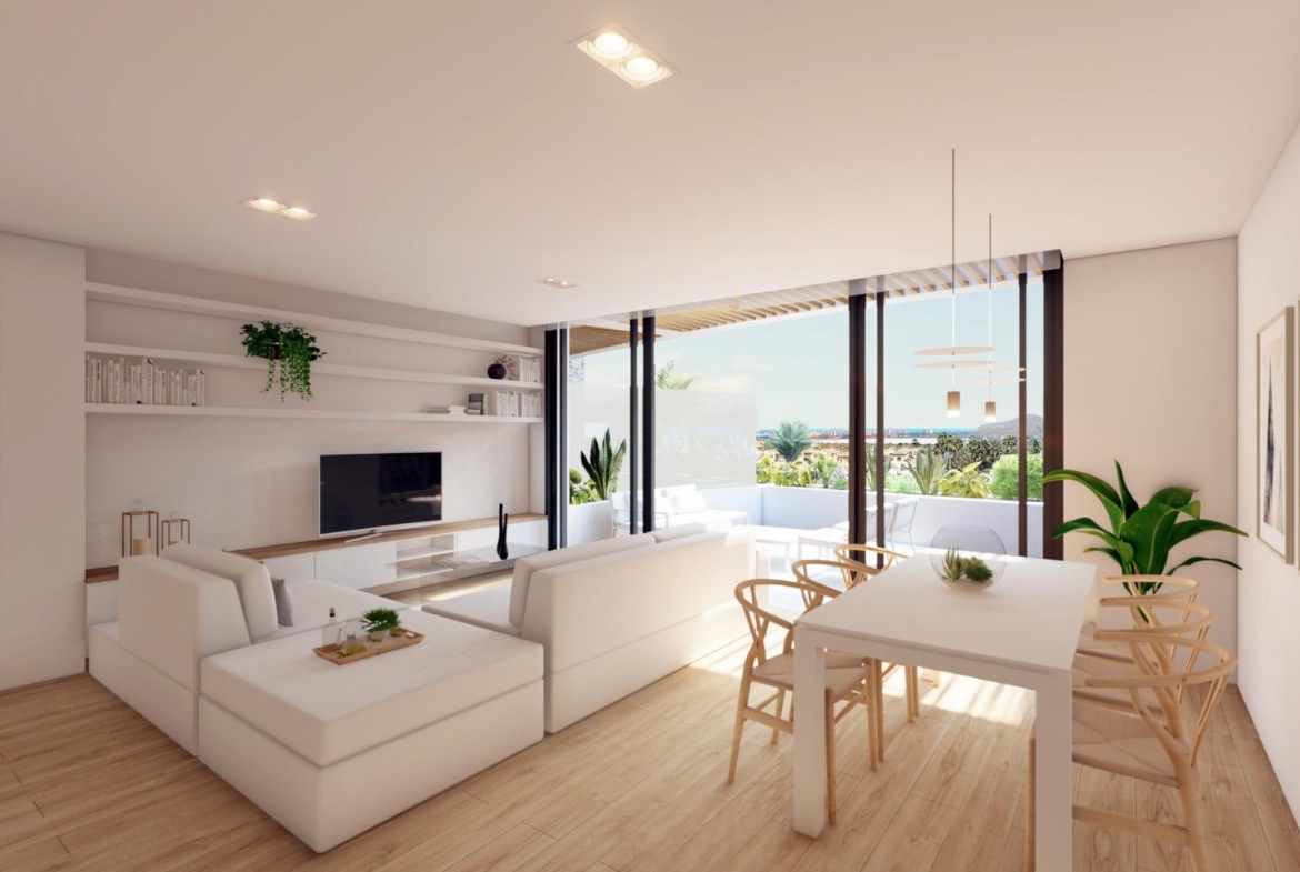 NEW-BUILD-RESIDENTIAL-COMPLEX-IN-LA-MANGA-CLUB-RESORT-4 Open-plan living and dining room with terrace and Mar Menor views