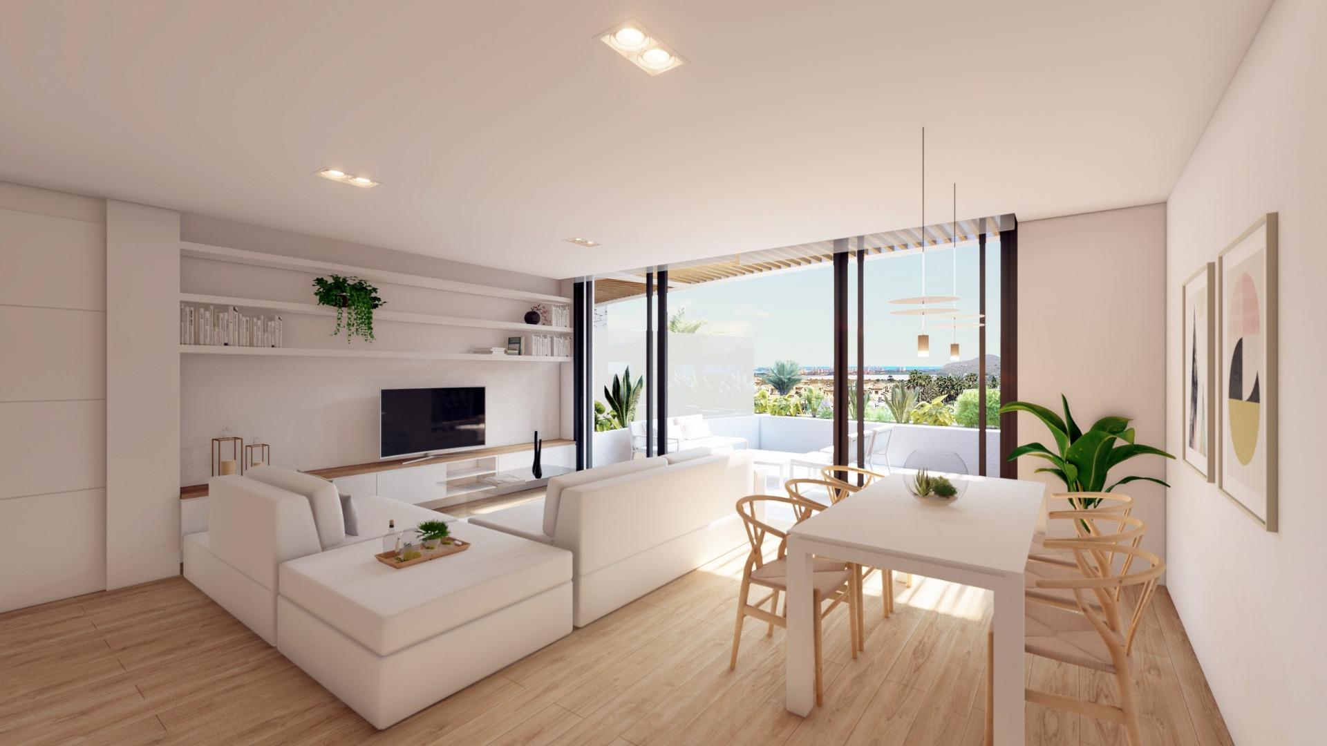 NEW-BUILD-RESIDENTIAL-COMPLEX-IN-LA-MANGA-CLUB-RESORT-4 Open-plan living and dining room with terrace and Mar Menor views