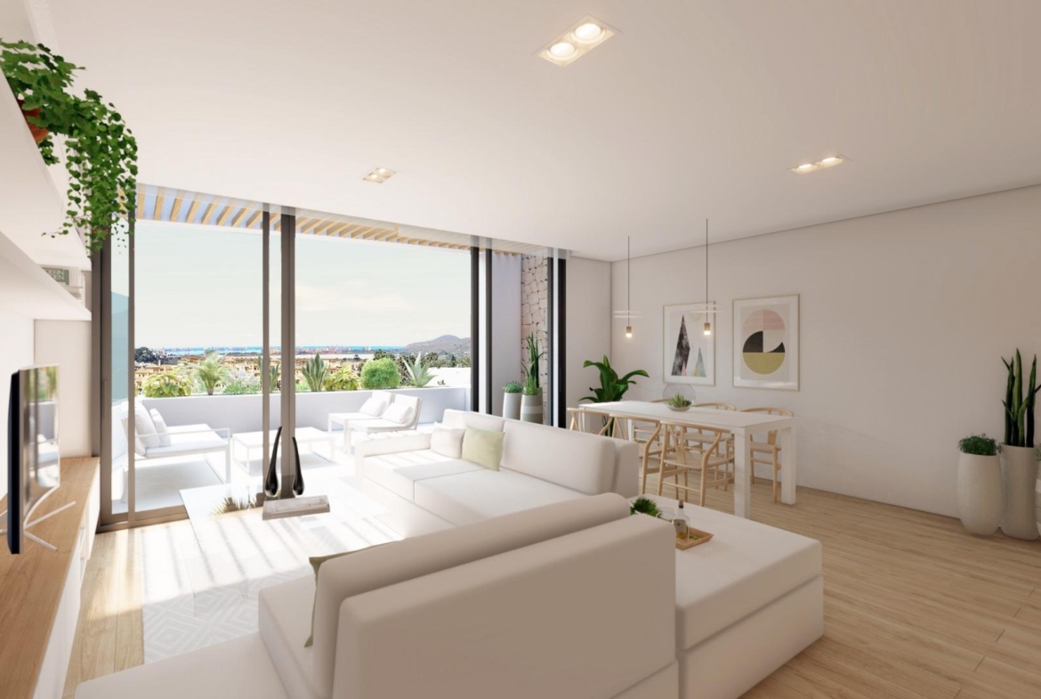NEW-BUILD-RESIDENTIAL-COMPLEX-IN-LA-MANGA-CLUB-RESORT-5 Bright living room with terrace and views across La Manga Club to the Mar Menor