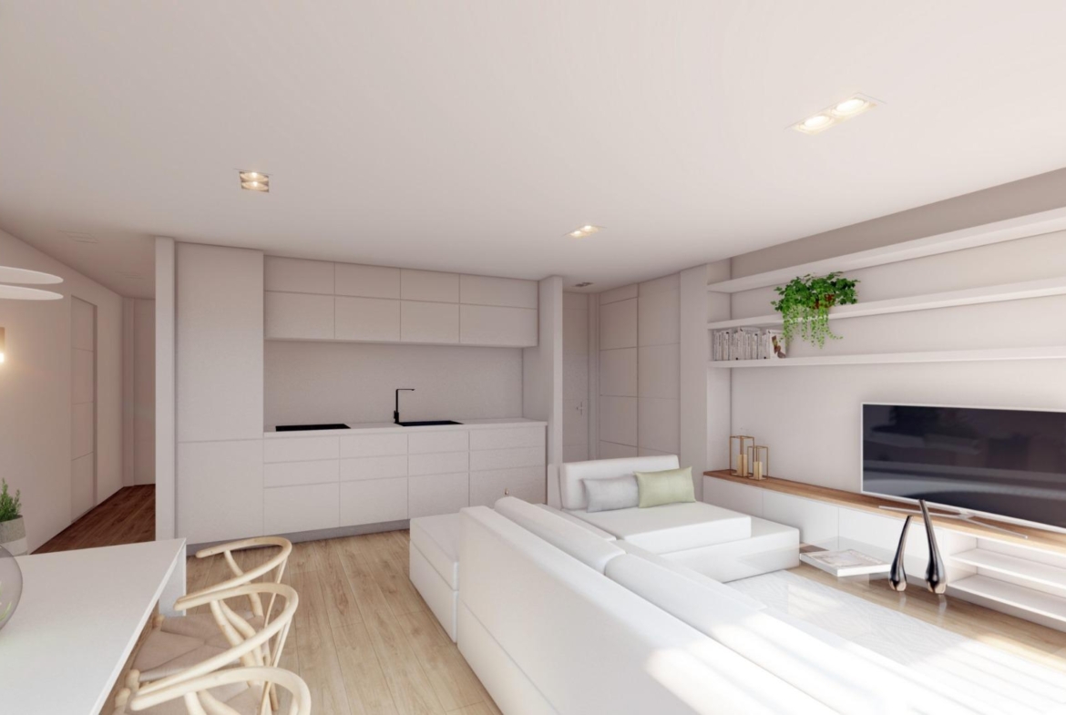 NEW-BUILD-RESIDENTIAL-COMPLEX-IN-LA-MANGA-CLUB-RESORT-6 Open-plan kitchen and living area with modern white finishes