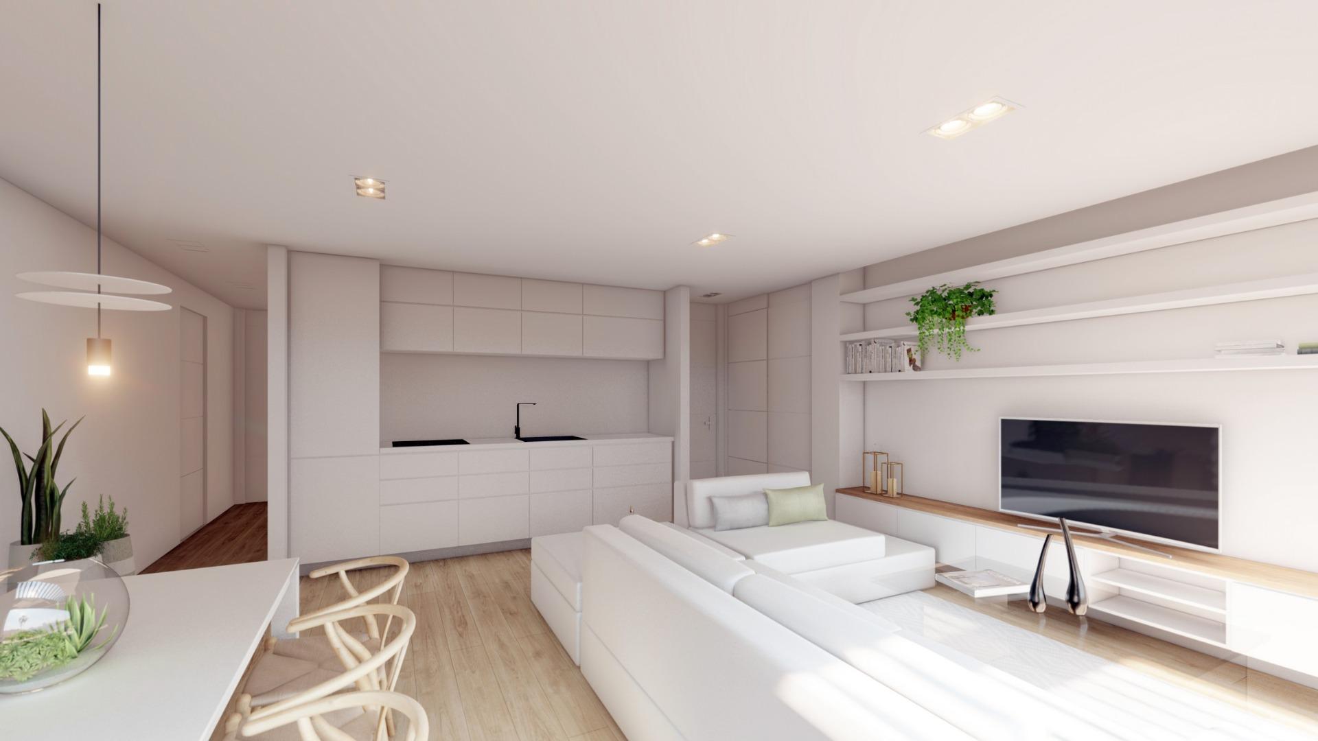 NEW-BUILD-RESIDENTIAL-COMPLEX-IN-LA-MANGA-CLUB-RESORT-6 Open-plan kitchen and living area with modern white finishes