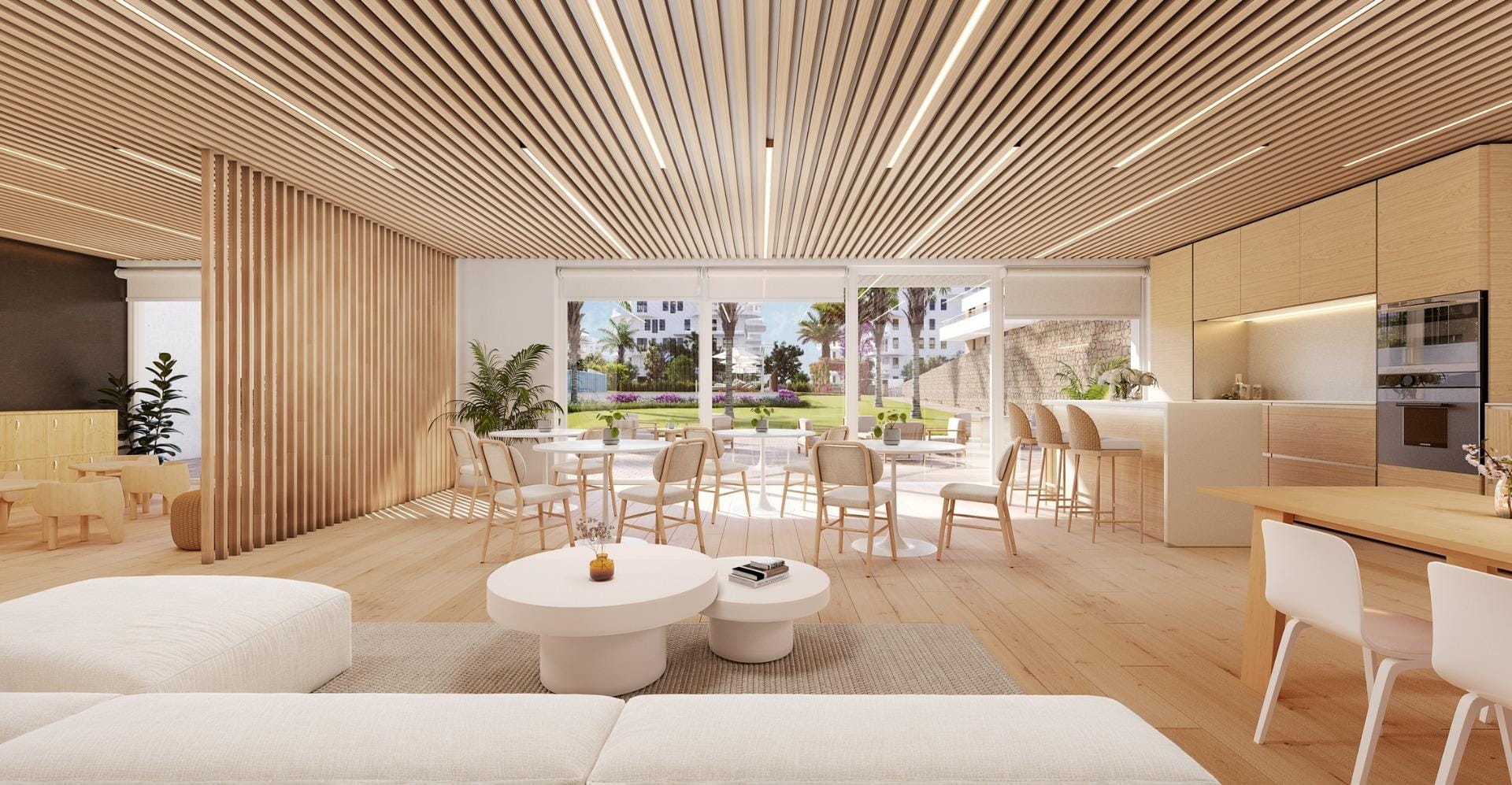 Residents lounge with seating and kitchenette in Playa del Torres, Villajoyosa, Alicante