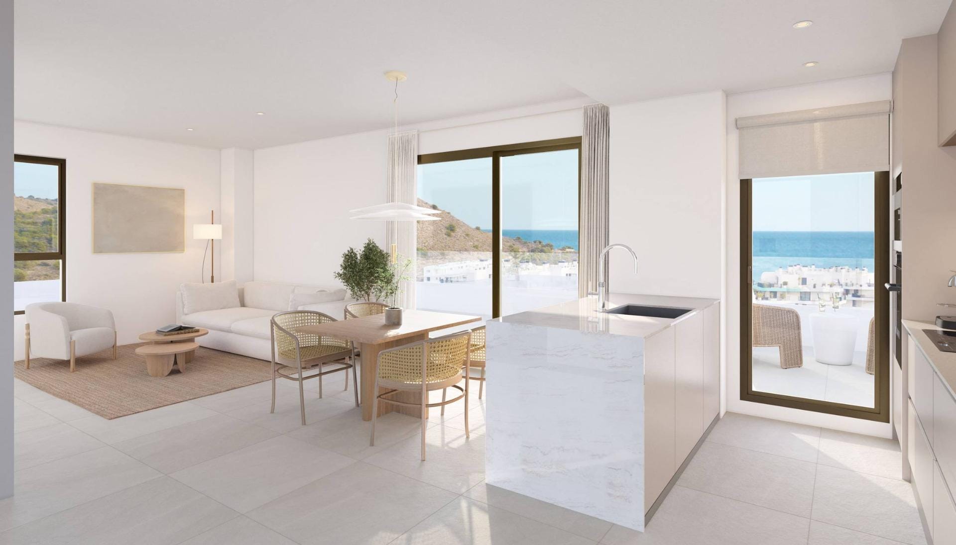 NEW-BUILD-RESIDENTIAL-COMPLEX-IN-VILLAYOJOSA-4 Kitchen island beside the dining area and terrace doors in Playa del Torres, Villajoyosa, Alicante