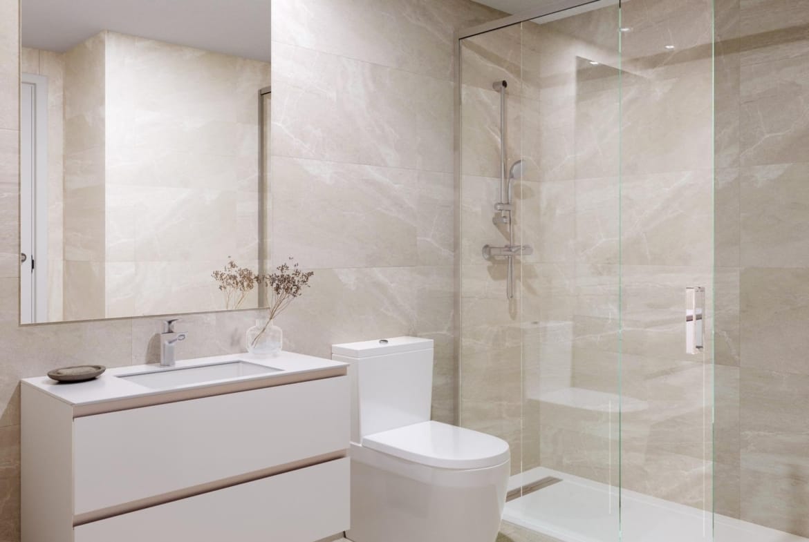 Bathroom with a glass shower enclosure and floating vanity in Playa del Torres, Villajoyosa, Alicante