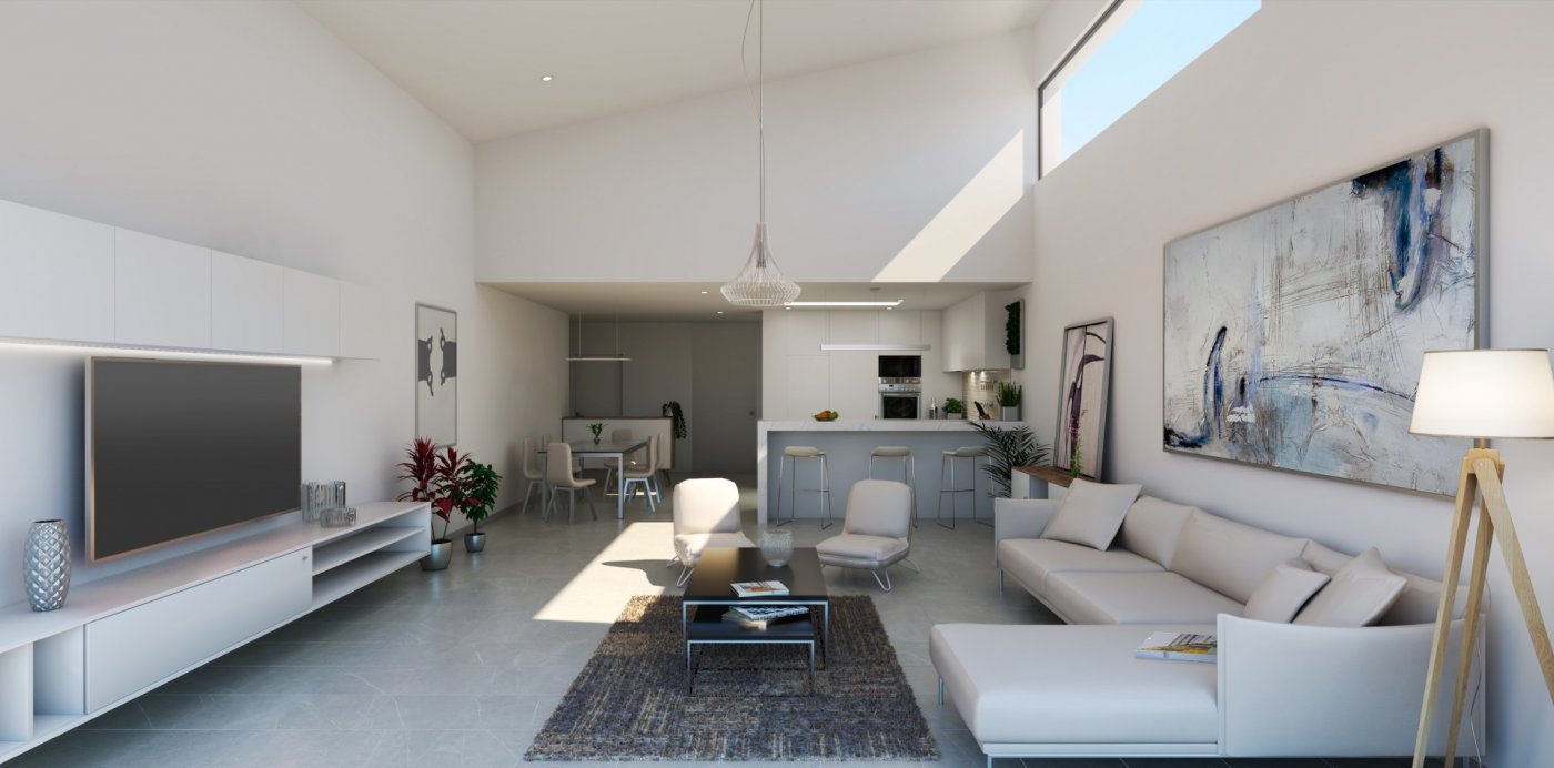 Dining area with white table, high horizontal clerestory window and kitchen breakfast bar