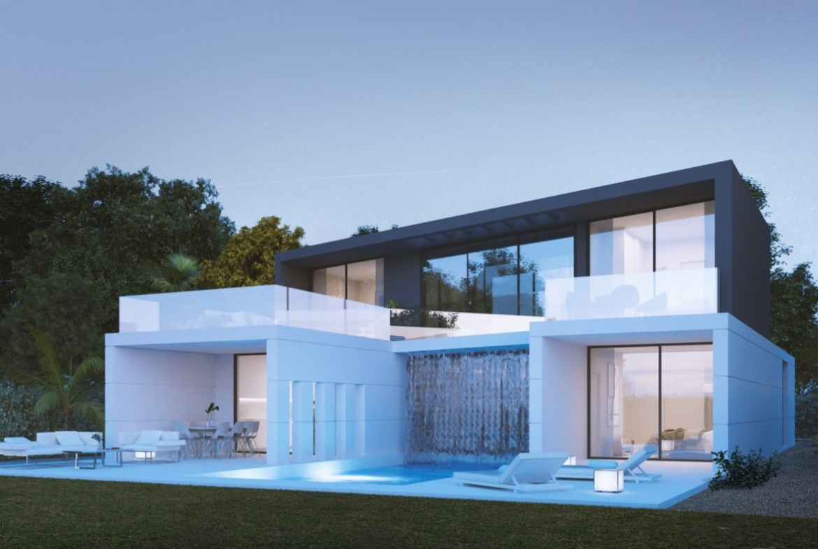 Two-storey villa exterior with glass balustrade terraces and illuminated pool at dusk